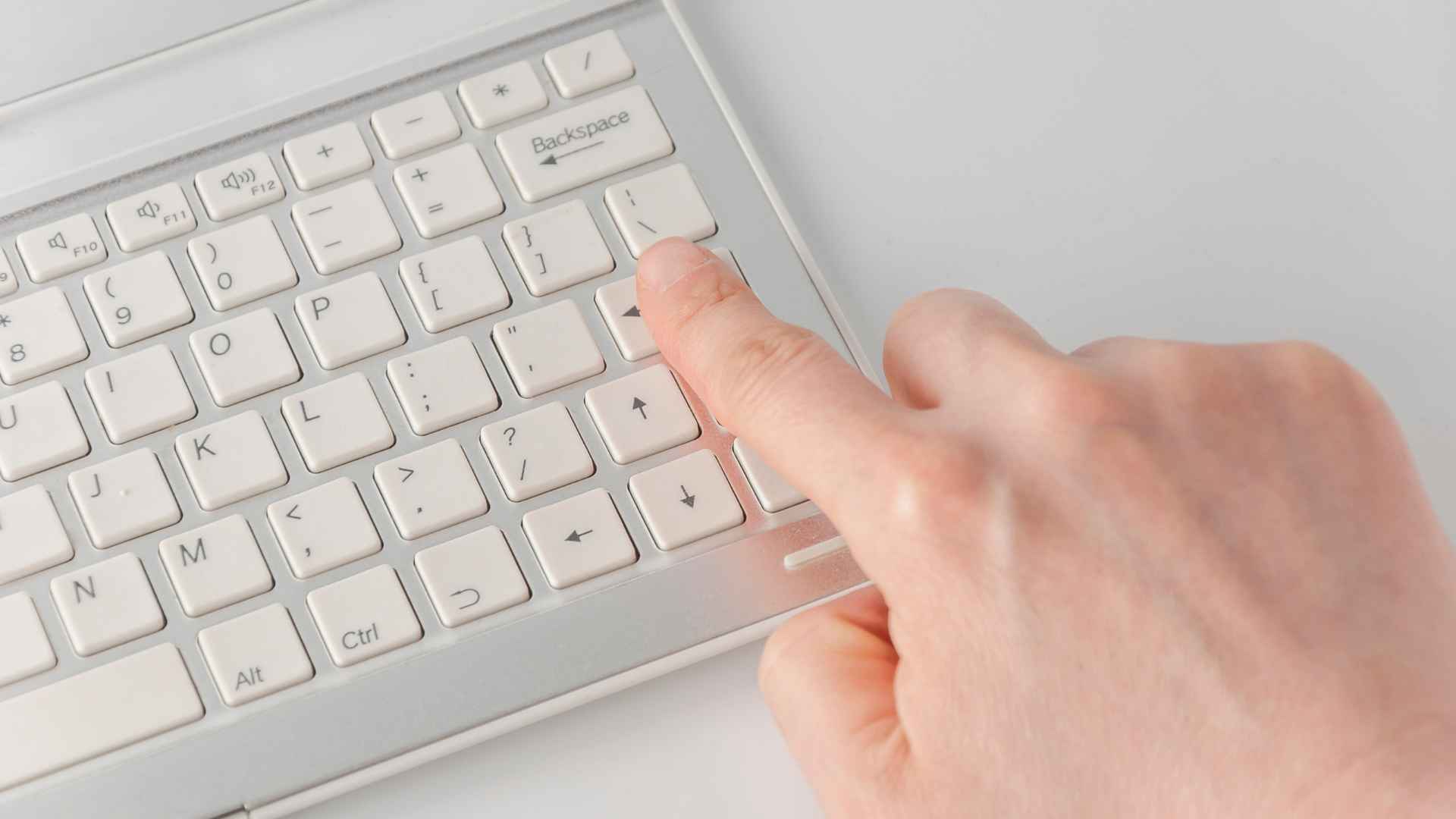 Finger pressing Enter on Keyboard - Nexacu