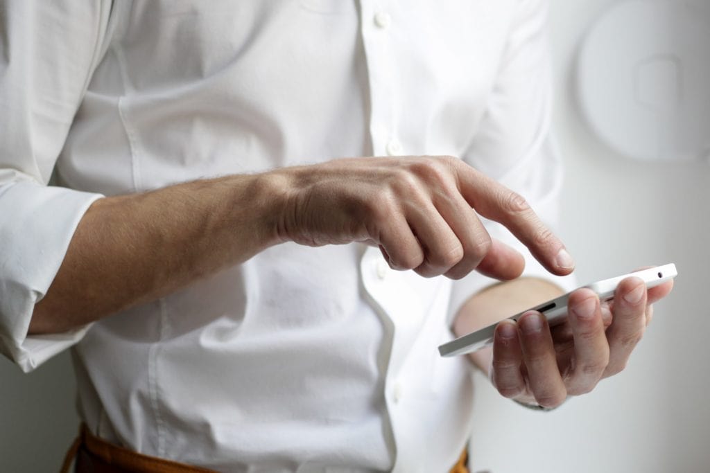 Man using phone to communicate